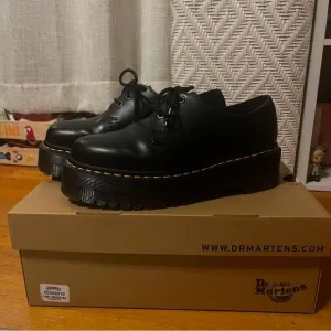 Black 1461 Quad Dr Martens Platform Shoes