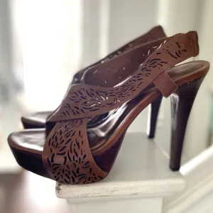 Diane VF Leather and wood high heels with laser cut details. Barely worn.