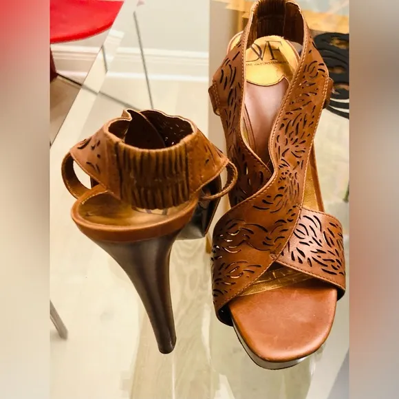 Diane VF Leather and wood high heels with laser cut details. Barely worn.
