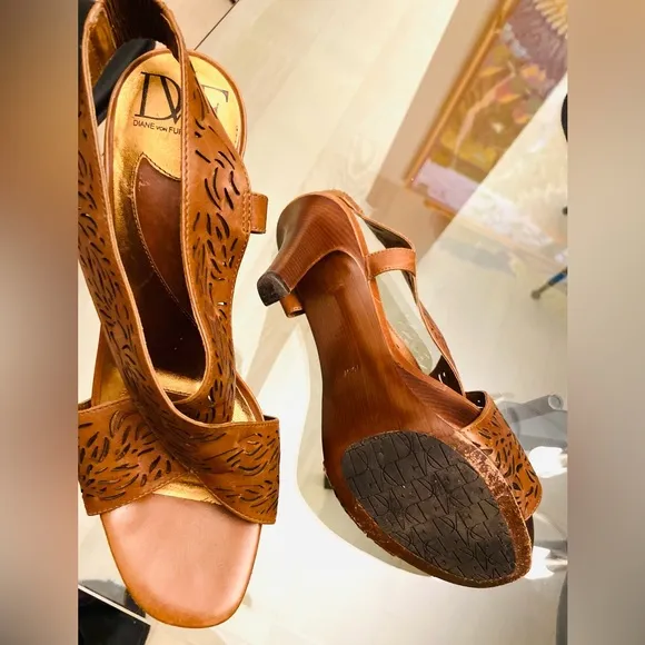 Diane VF Leather and wood high heels with laser cut details. Barely worn.