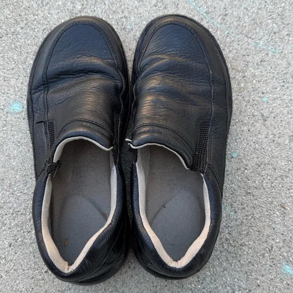 Dr. Martens Black Leather Slip On Shoes size 10 Mens size 11 women’s Preowned