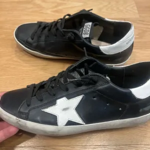Golden Goose Black and White Sneakers