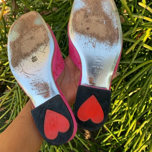 Moschino slides women Fuchsia leather hearts and Stitch logo detail shoes.
