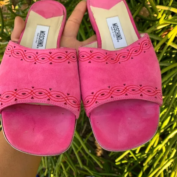 Moschino slides women Fuchsia leather hearts and Stitch logo detail shoes.