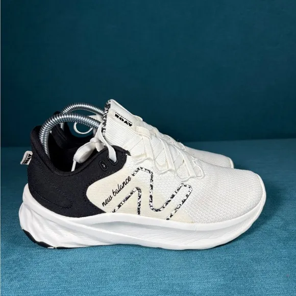 Size 7.5 - Women’s New Balance Roav white and black shoes
