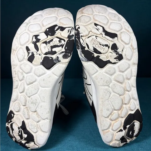 Size 7.5 - Women’s New Balance Roav white and black shoes