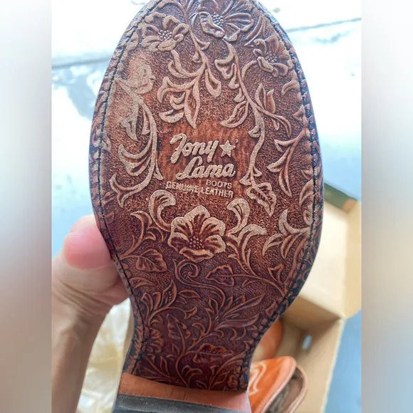 Woman Brown and Tan Cowboy Boots